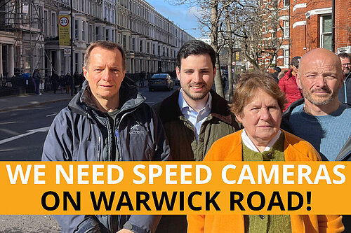 Four Lib Dem activists standing by Warwick Road, Earl's Court