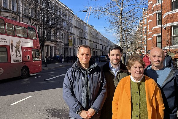 4 Lib dem activists next to Warwick Road, Earls Court